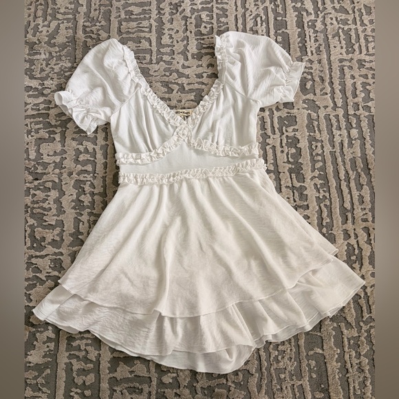 Sacred Hearts Pants - Elegant White Ruffled Jumpsuit